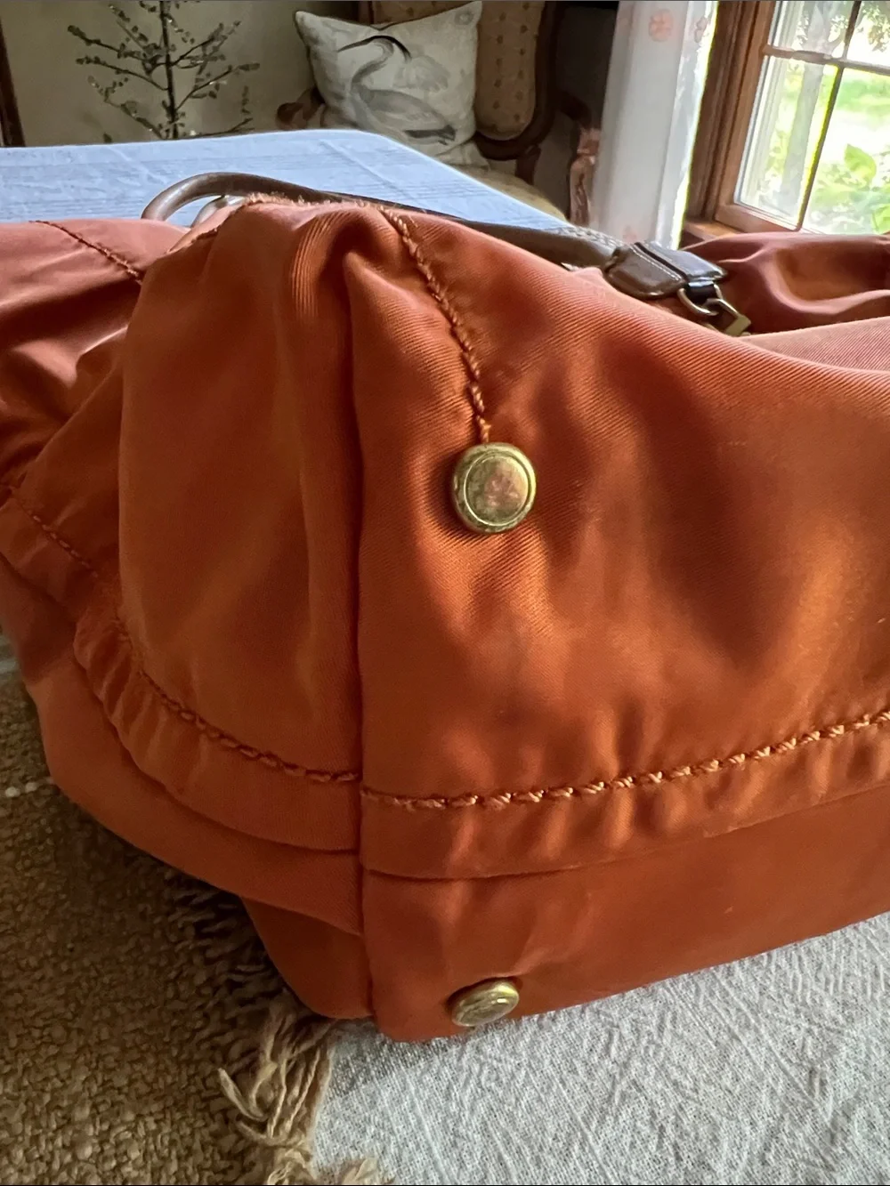 Tumi Orange Nylon Tote with Tan Leather Handles. Pre owned.